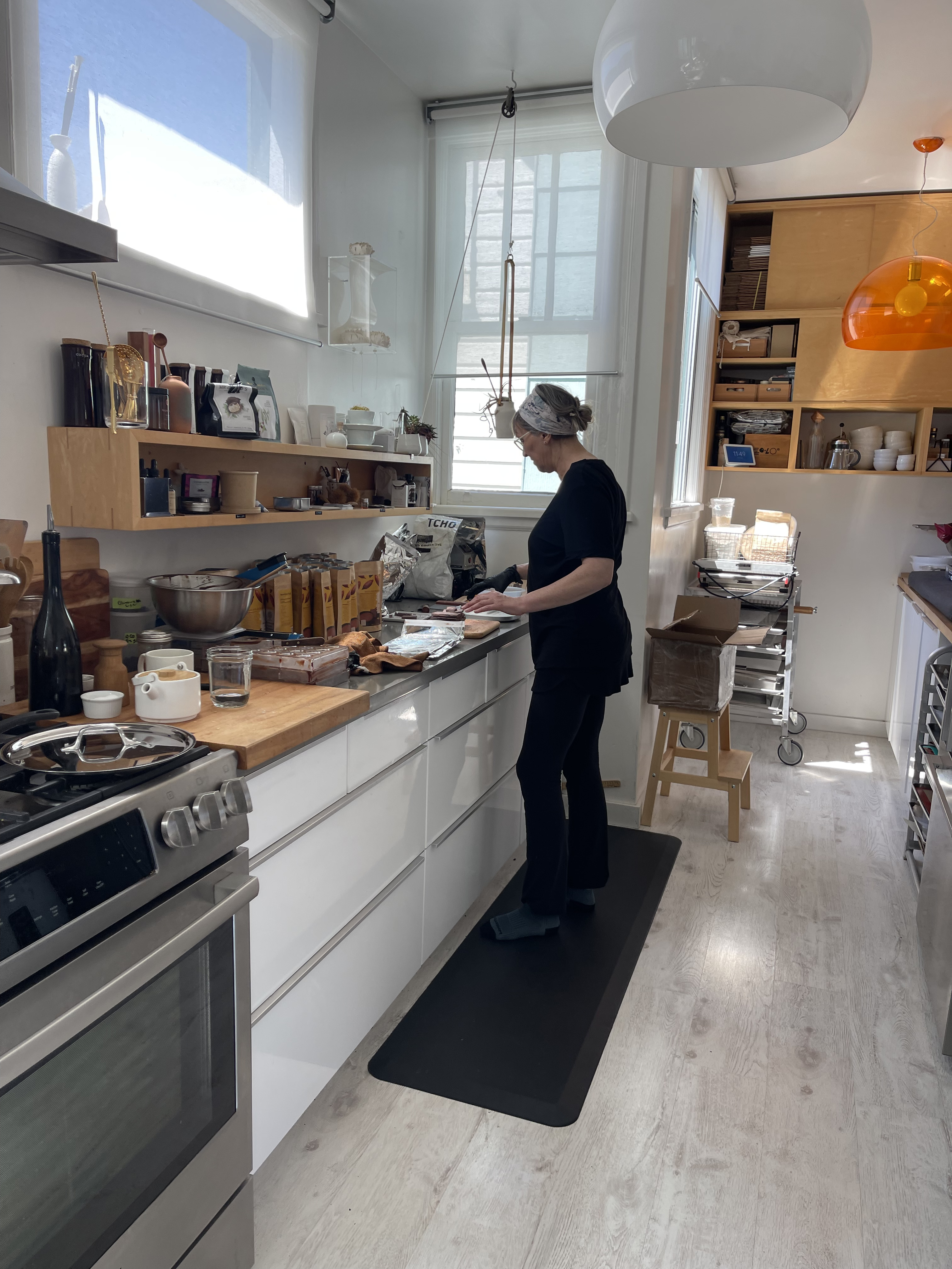 Kirsten preparing chocolate in Kiki's Cocoa kitchen